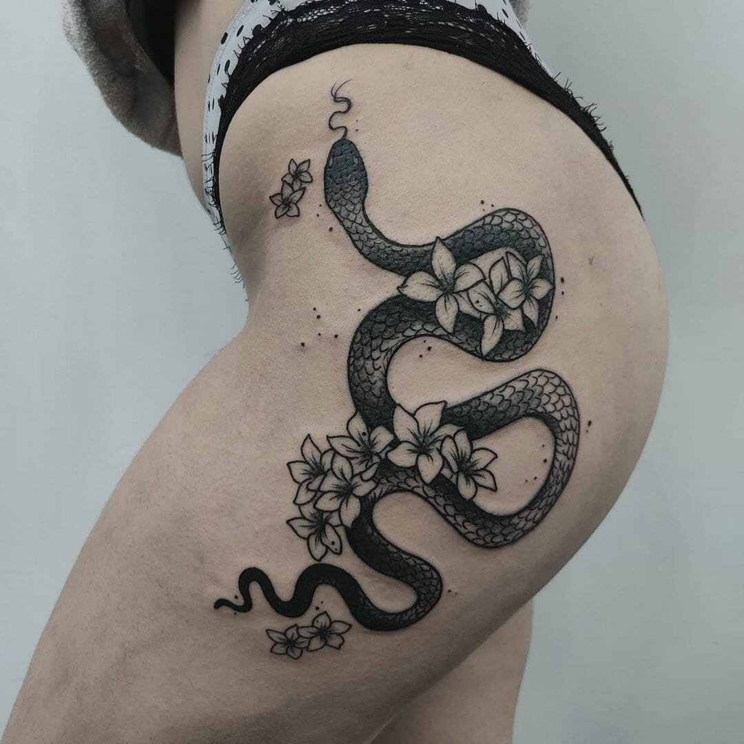 Black Mamba With Flowers Tattoo