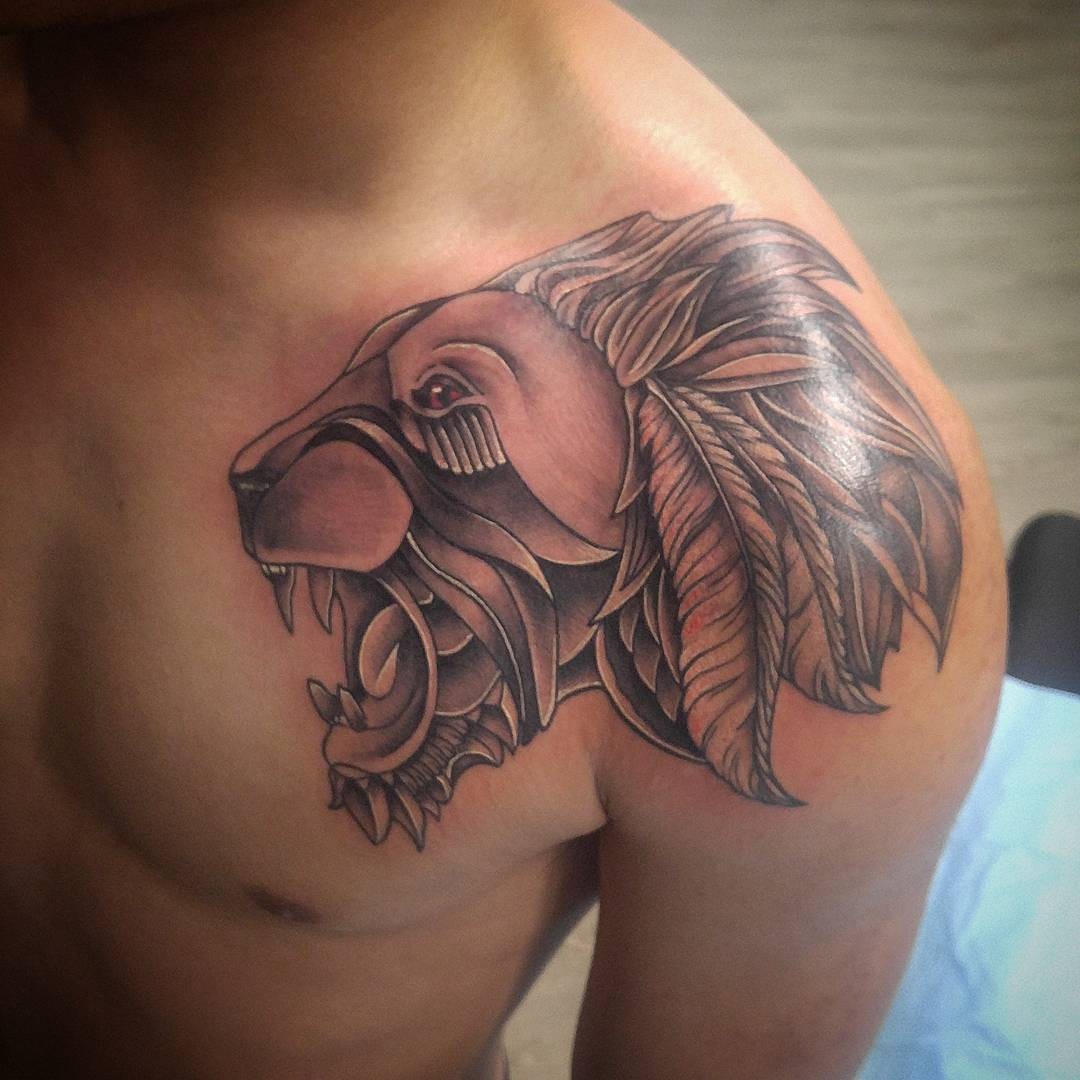 Geometric Lion Tattoo Over Shoulder & Chest