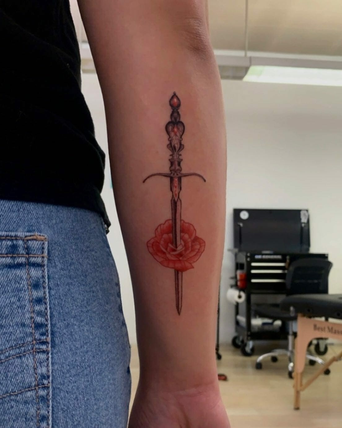 Stunning Sword And Rose Tattoo