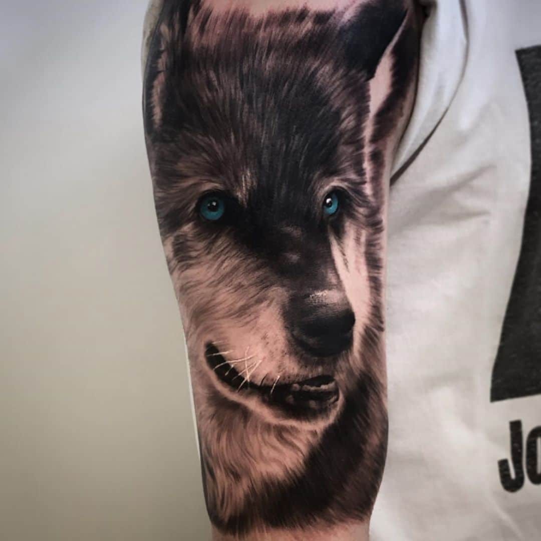 Realistic Wolf Sleeve Tattoo