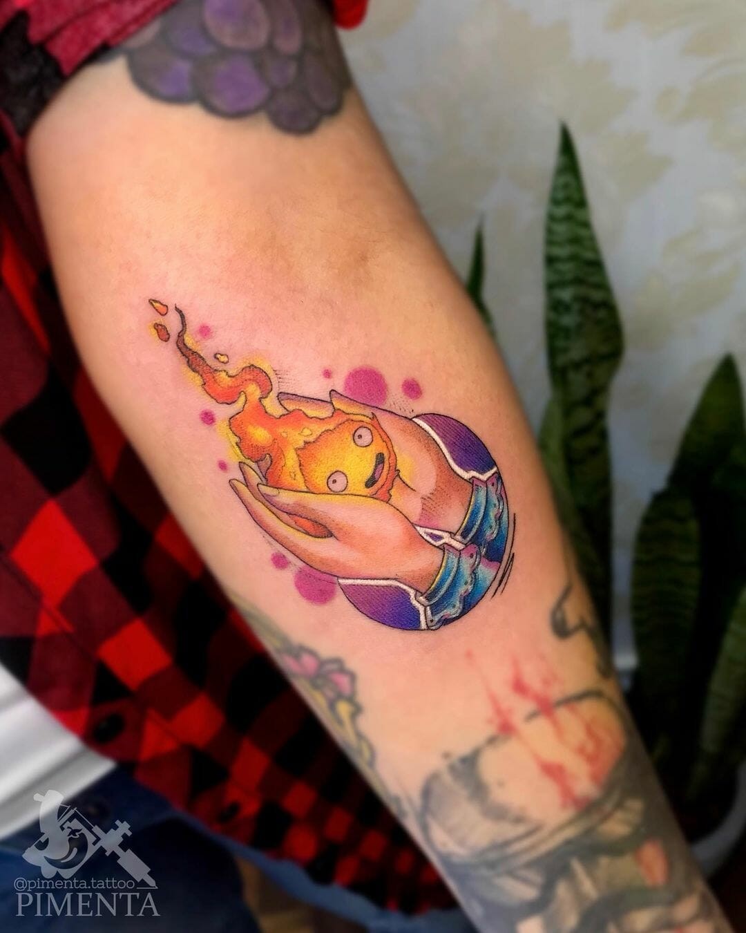 Calcifer In Sophie’s Hands Tattoo