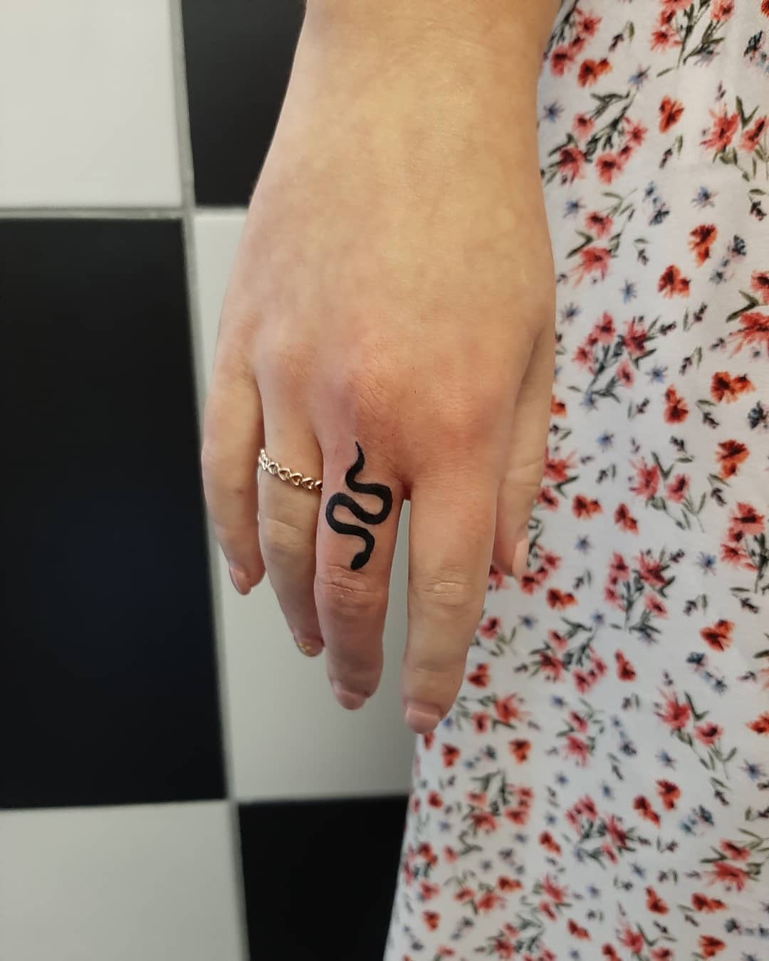 Minimalist Snake Tattoo