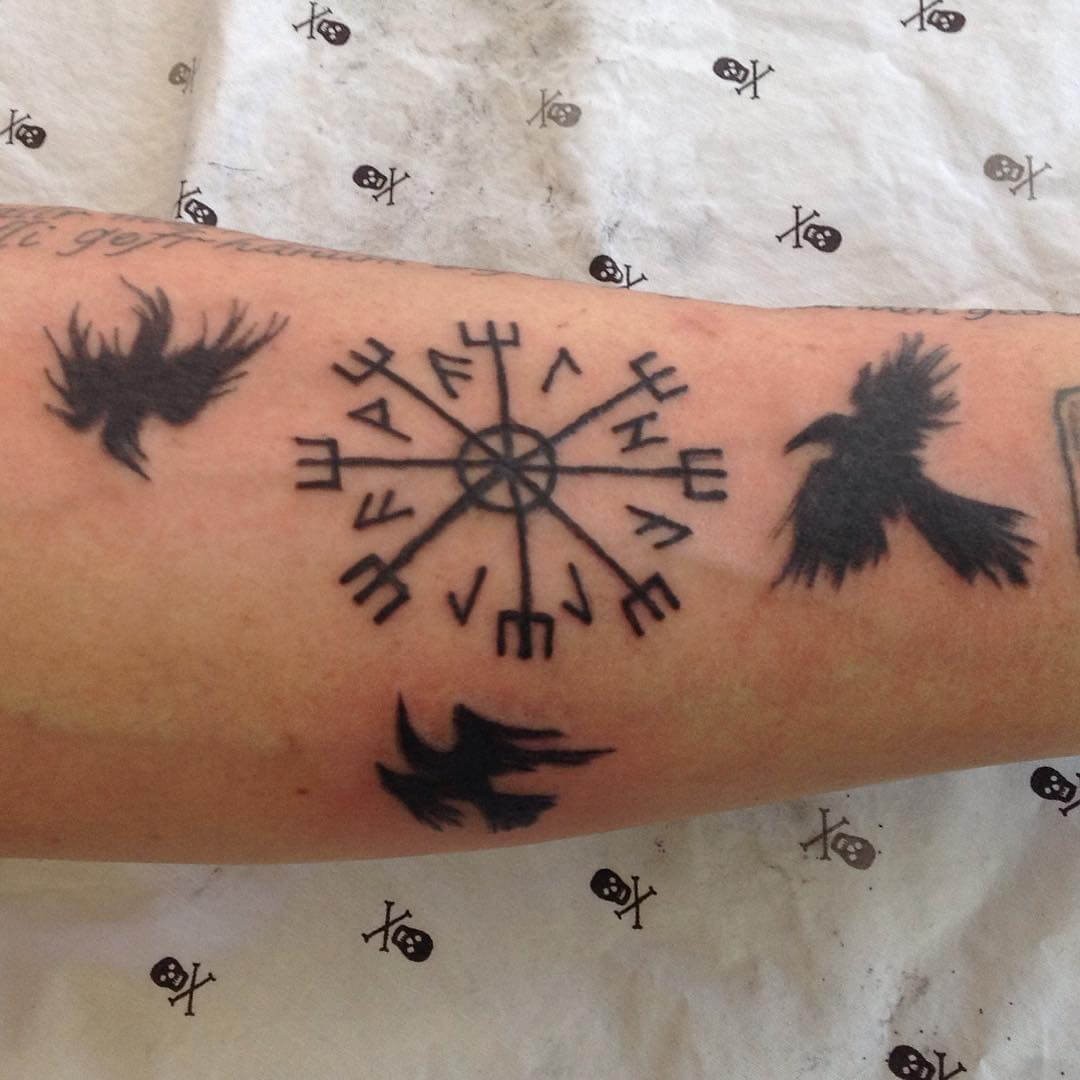 Minimalistic Helm Of Awe Viking Tattoo With Messenger Ravens In Black Ink