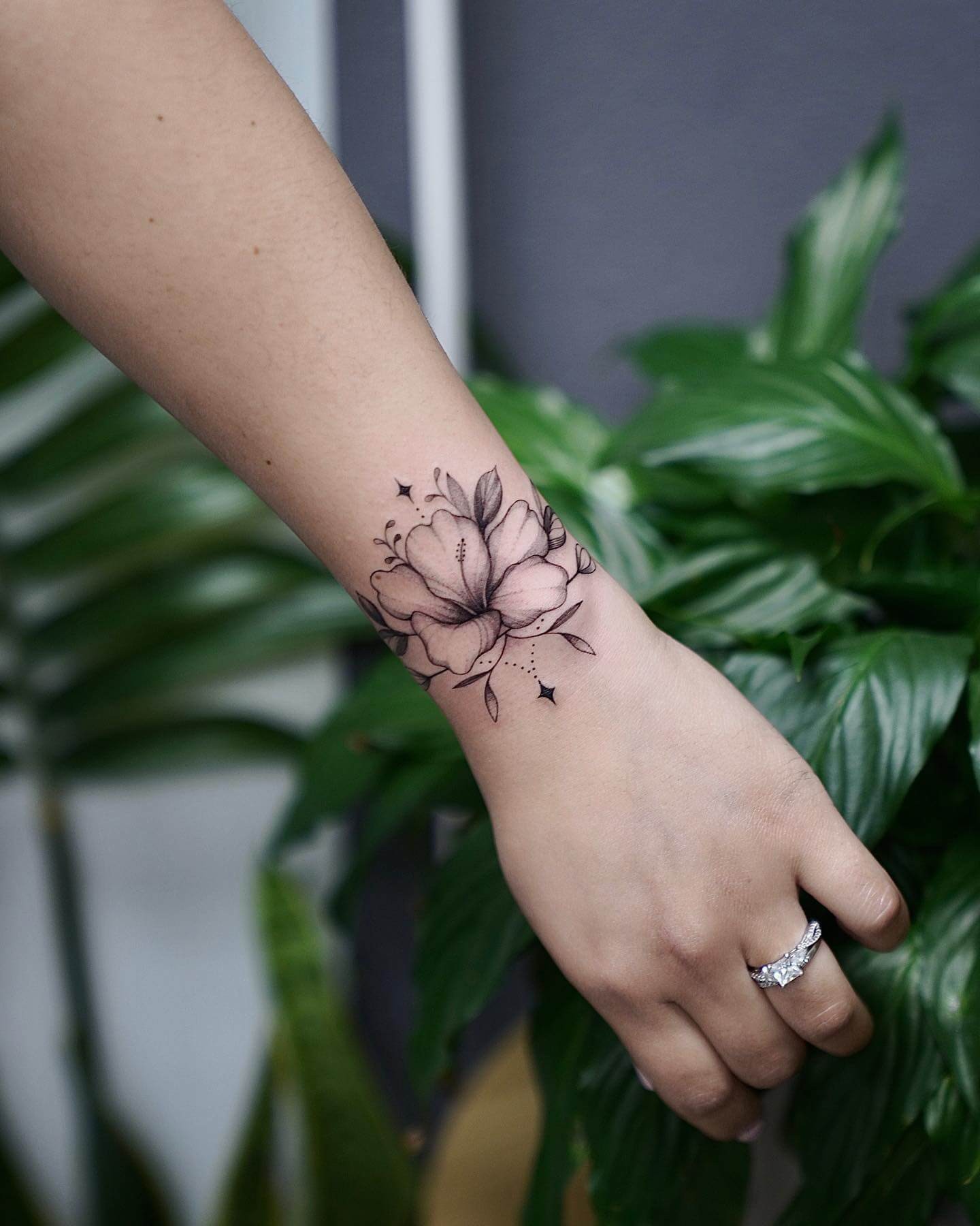 Wrist Hibiscus Tattoo