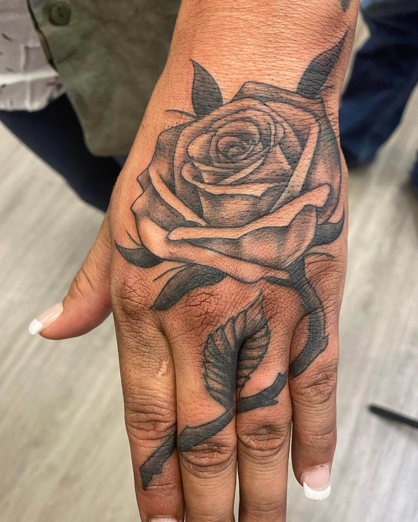 Beautiful Black On Hand Rose Tattoo For Male