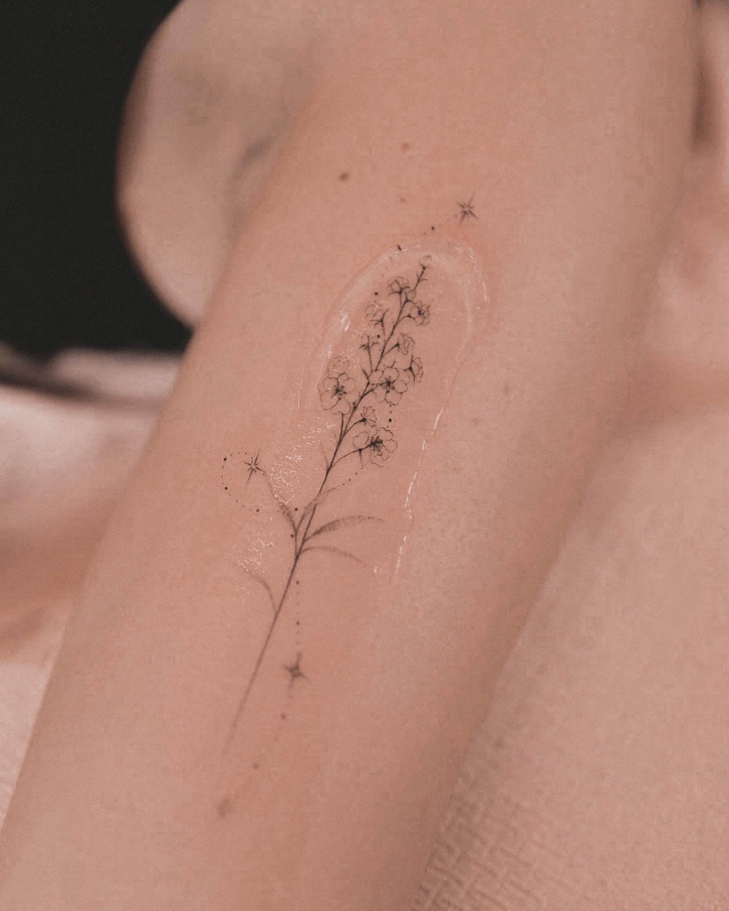 Fine-line Outlined Delphinium Tattoo