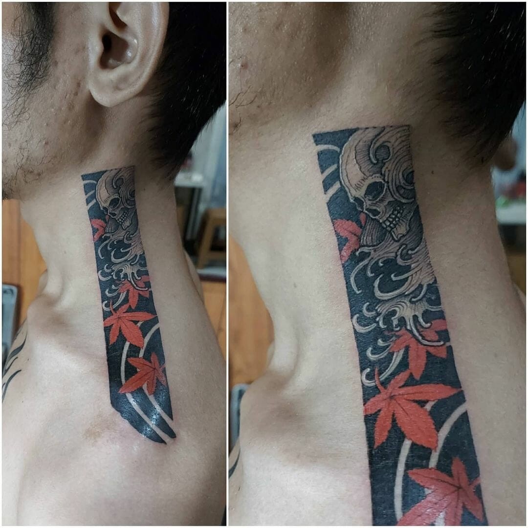 Falling Maple Leaf Tattoo With Skull