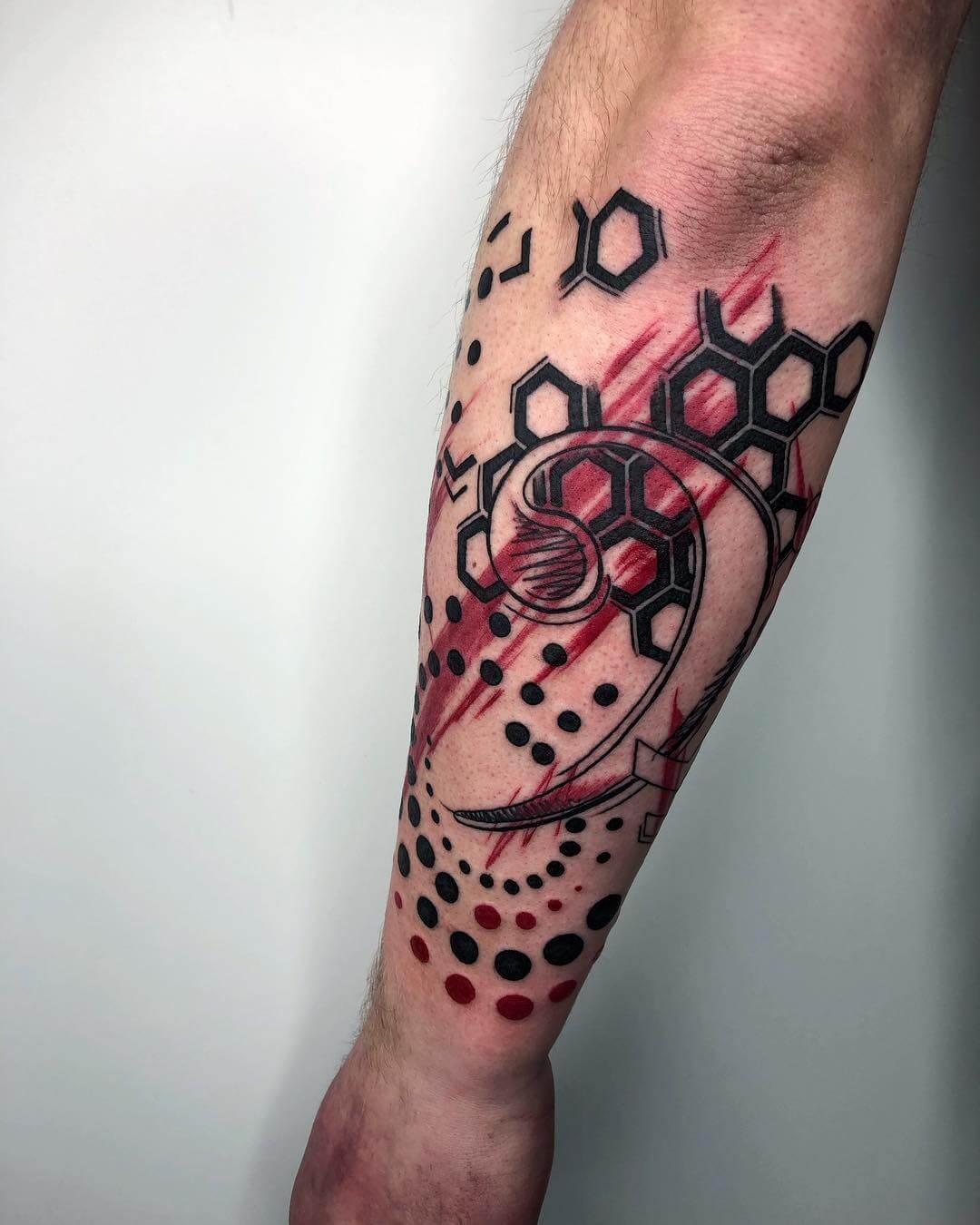 Geometric Forearm Bass Clef Tattoo