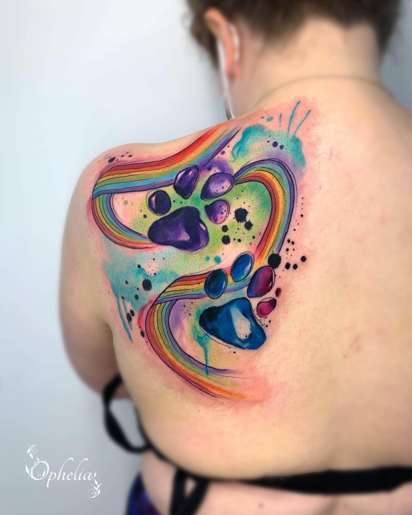 The Blue And Violet Pawprint Rainbow Bridge Tattoo