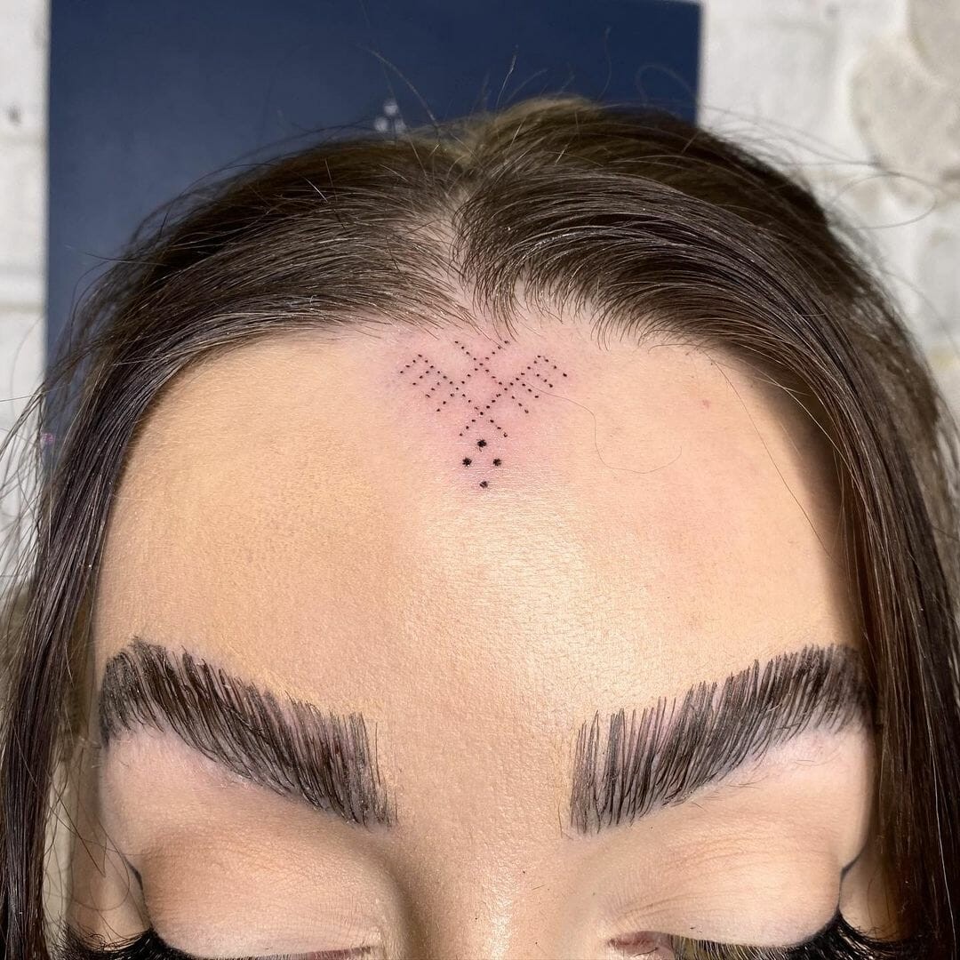 Handpoked Forehead Tattoo