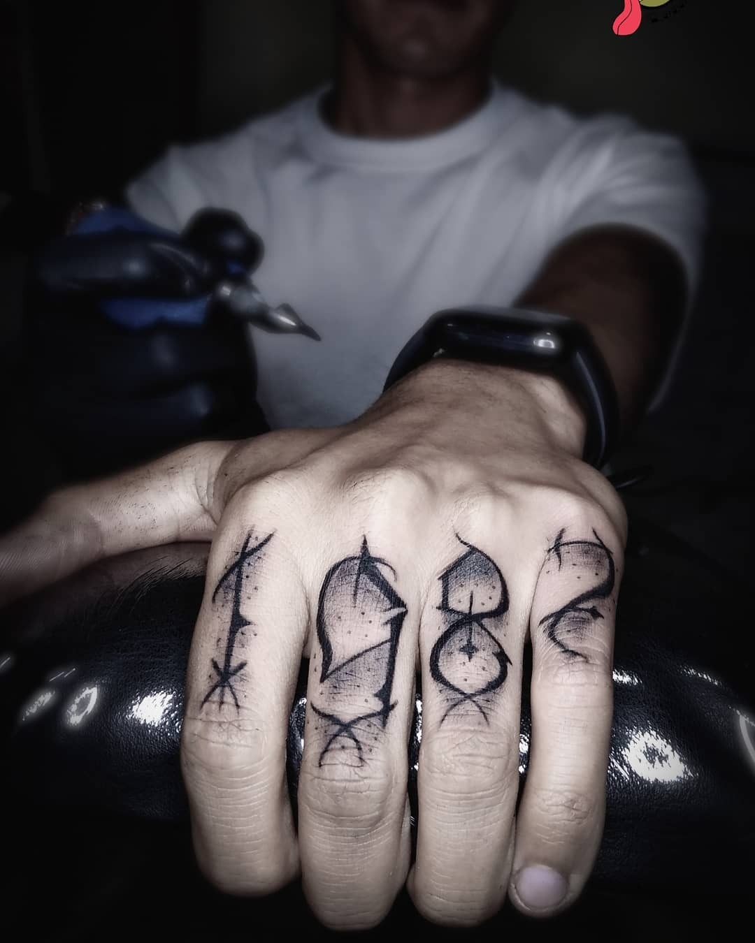 1987 Tattoo Design On Fingers