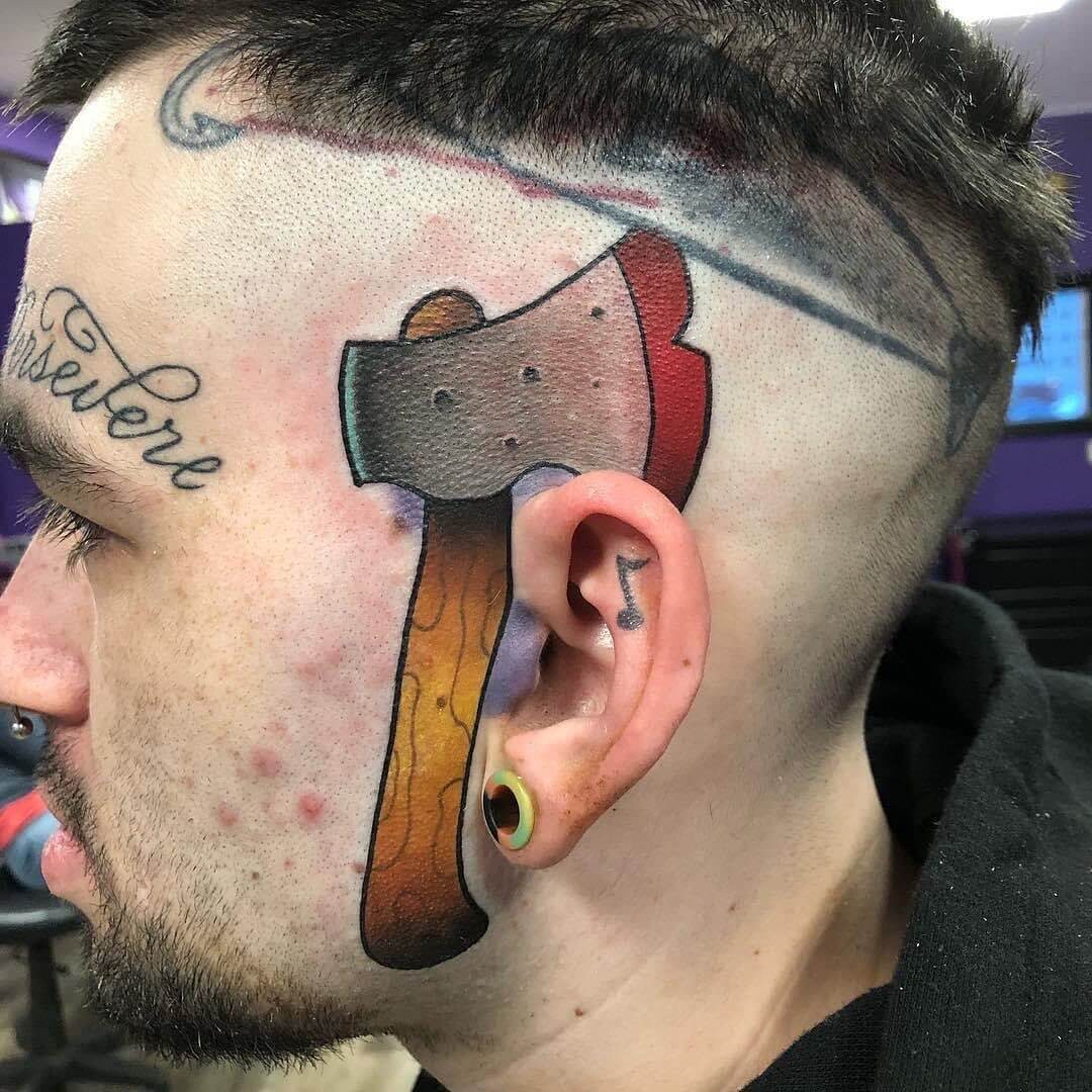 Bold Axe Tattoo On Face