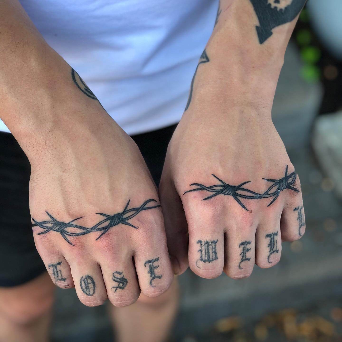 Font Knuckle Tattoo With Barbed Wire