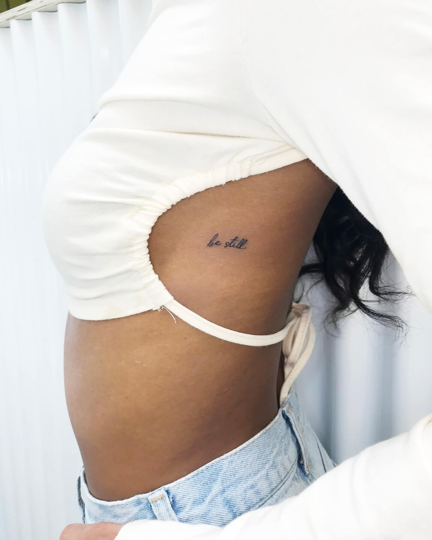 Lovely Tiny Lettering Rib Tattoo