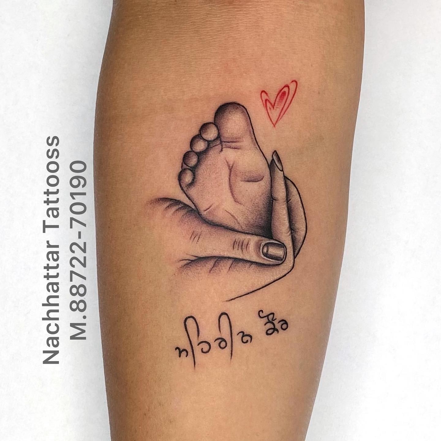 Mother Holding Child’s feet Tattoo