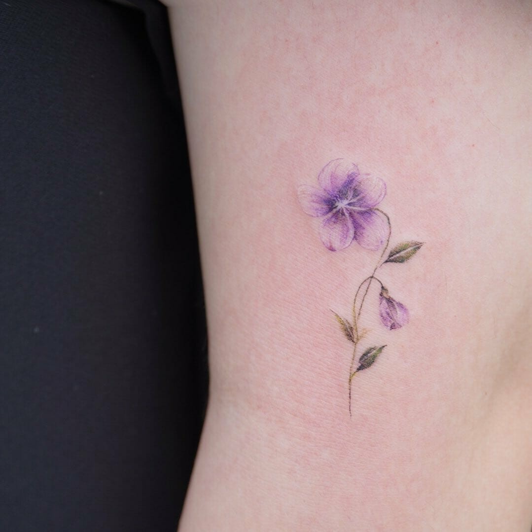 Small Purple Flower Tattoo