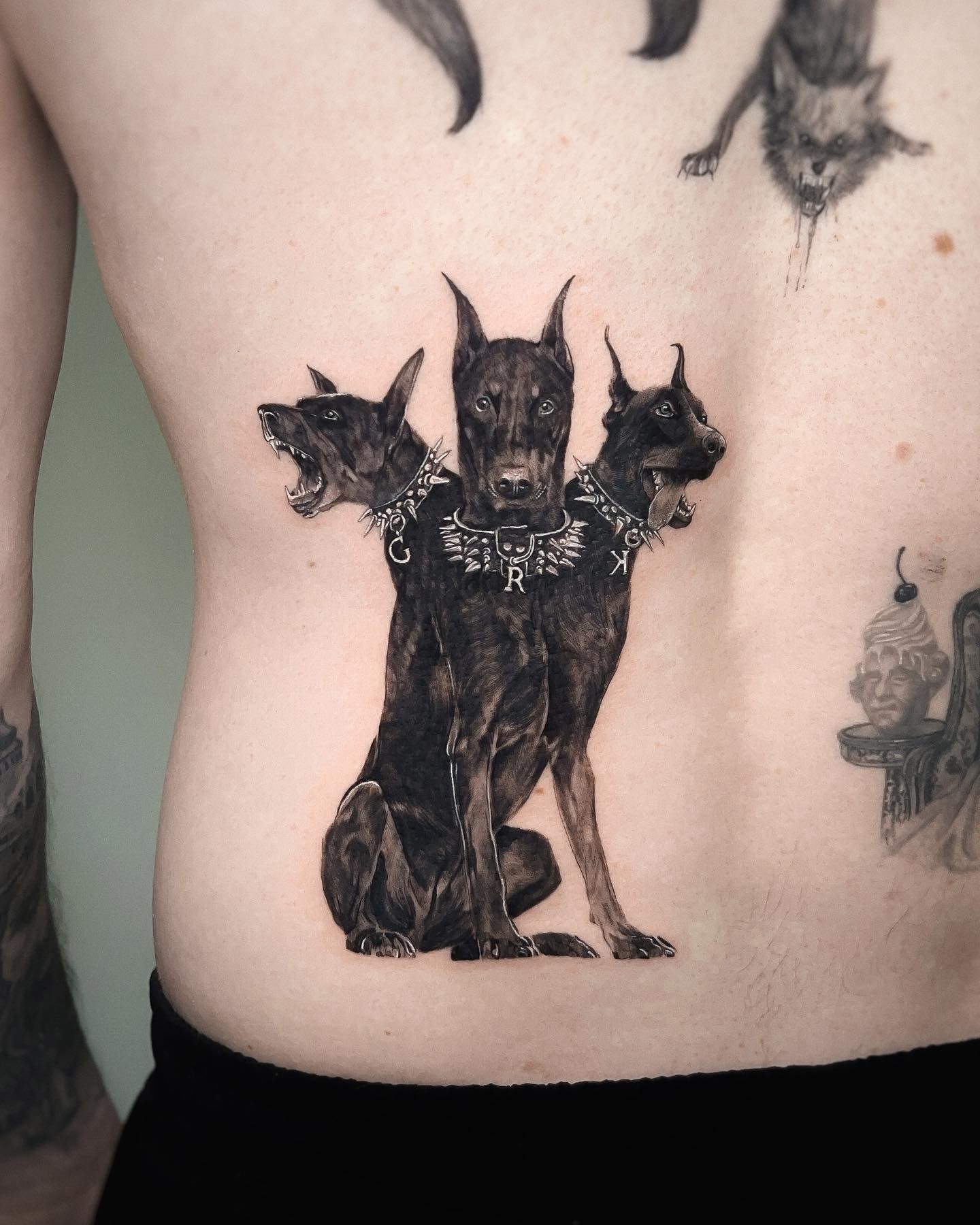 Doberman Tattoo With Three Heads