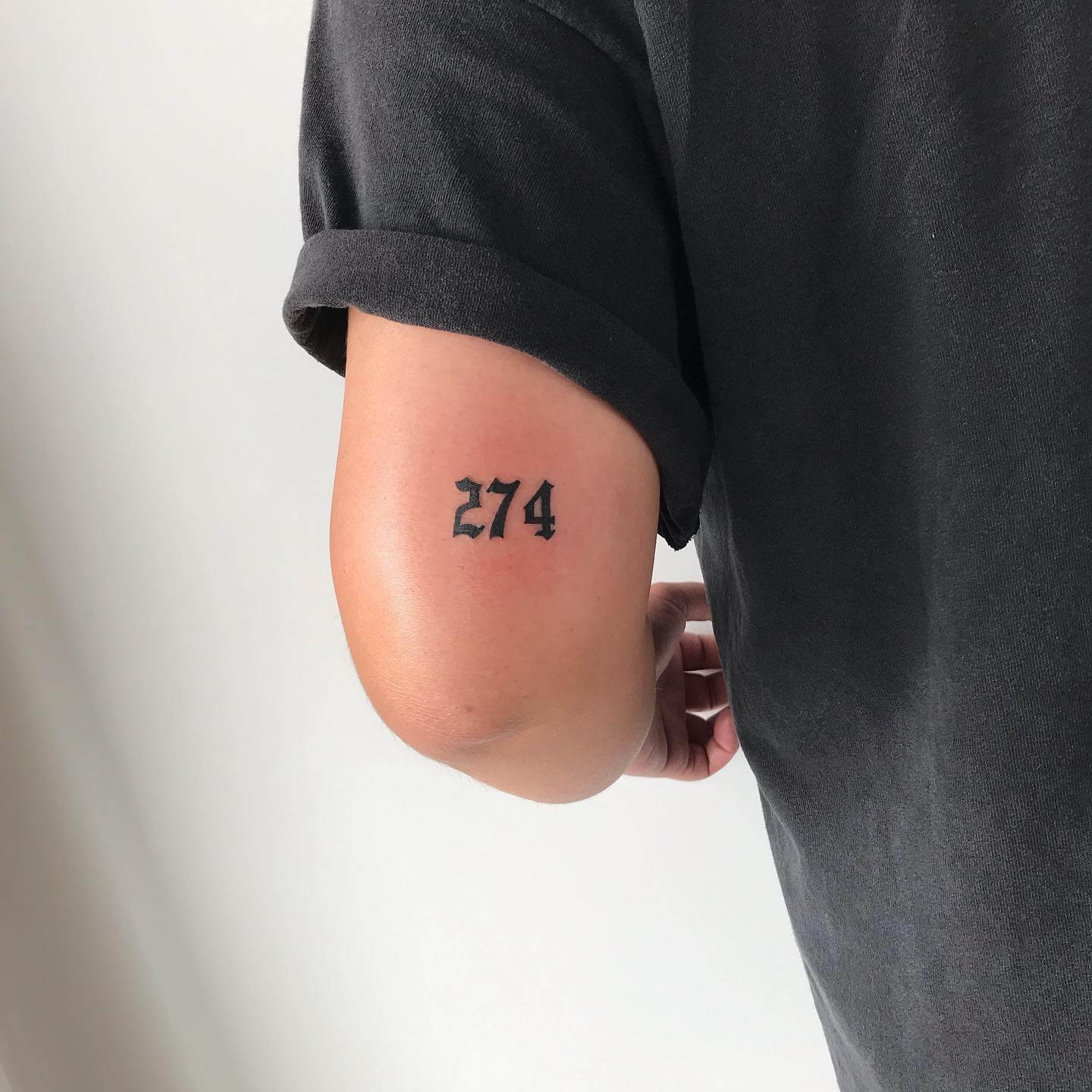 Upper Arm Area Code Tattoo