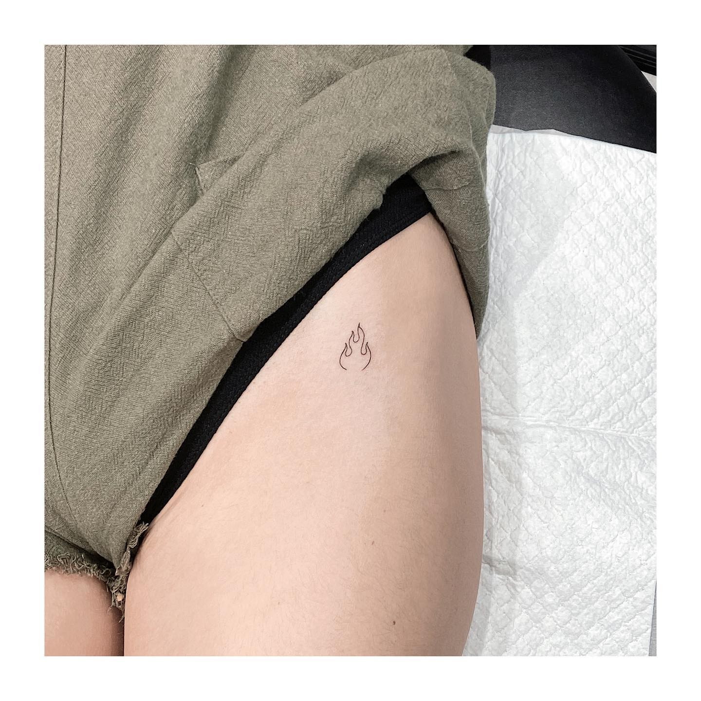 Simple Small Flame Tattoo