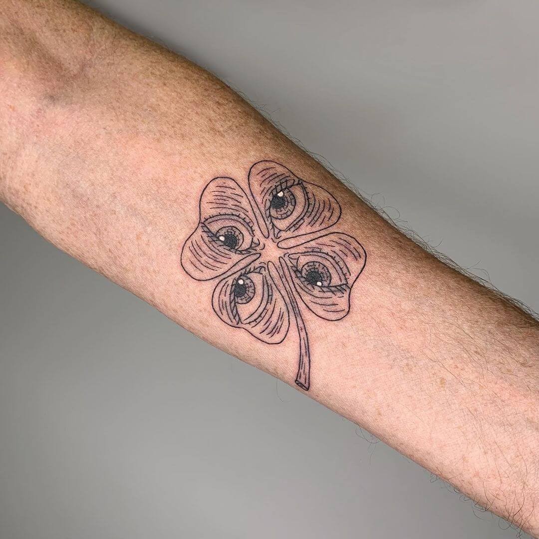 Four Leaf Clover With Intriguing Eye Symbols Tattoo