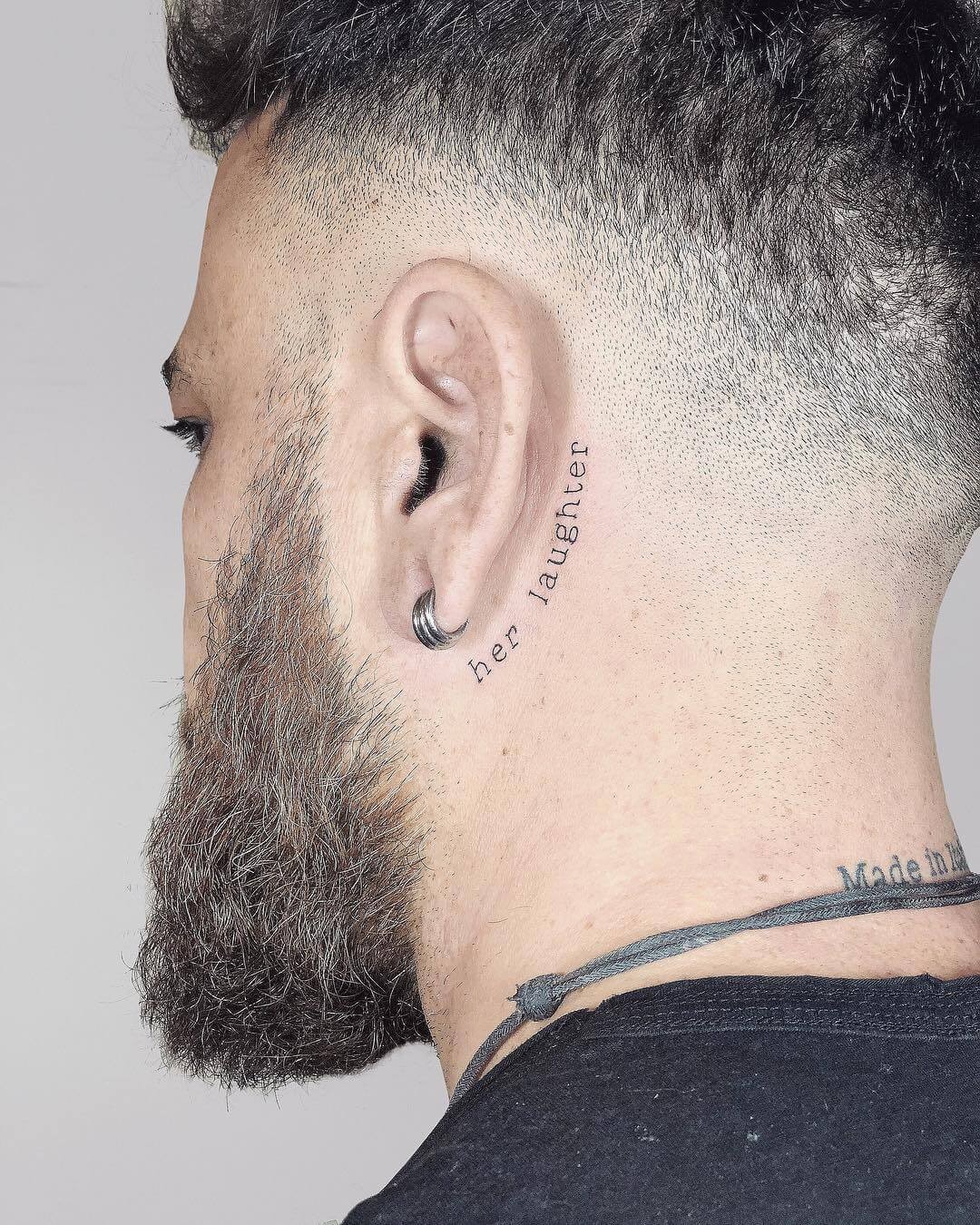 Love Themed Laugh Ear Tattoo