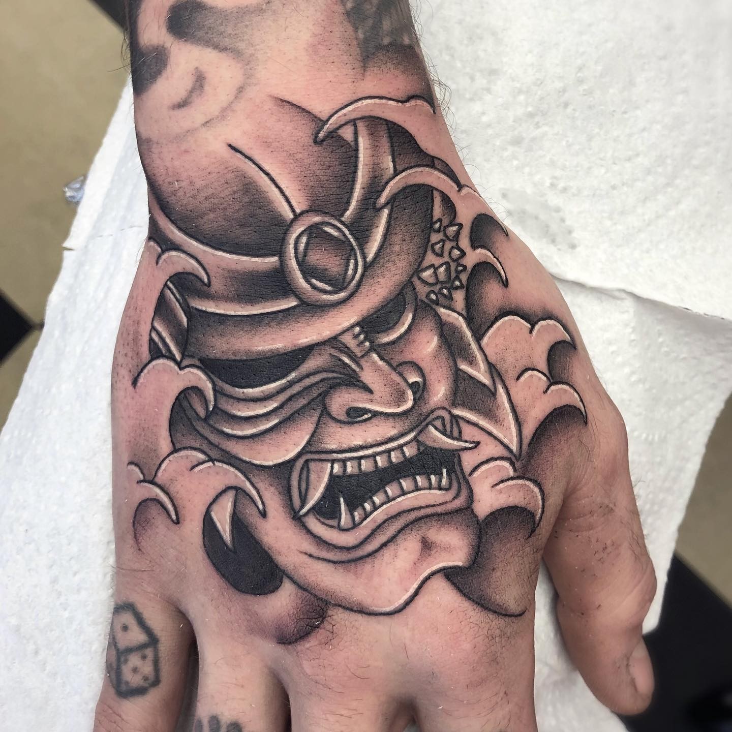 The Minimalist Japanese Samurai Mask tattoo