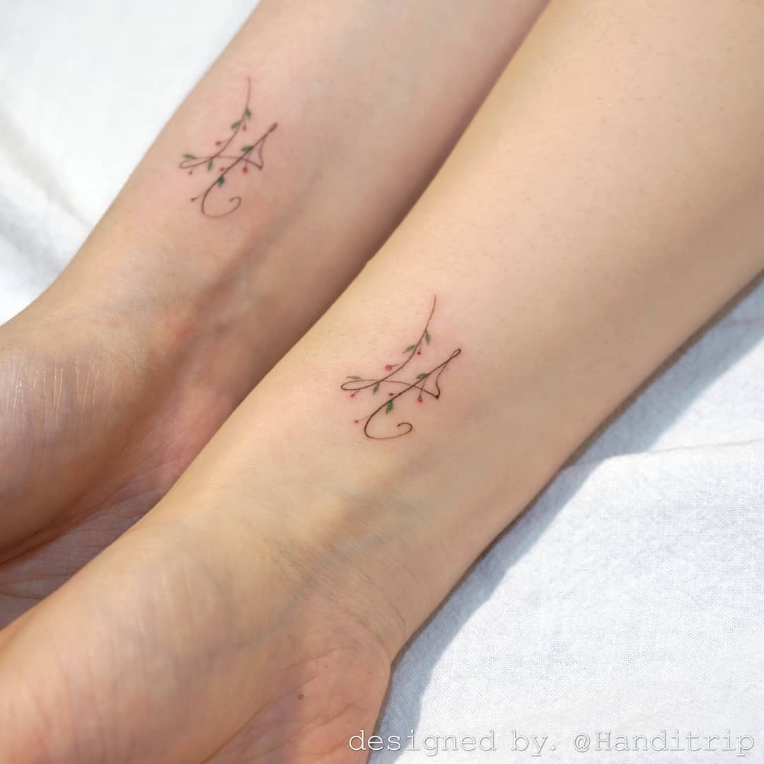 Identical Designs For Big Sister & Small Sister Tattoos