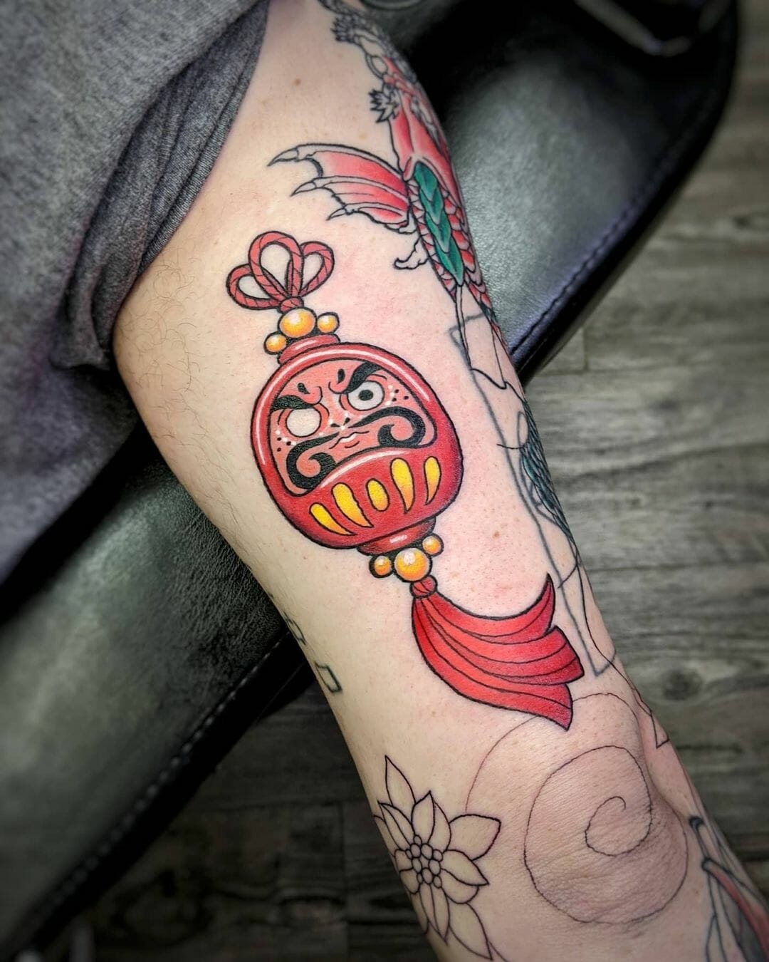 Vividly Colourful Daruma Doll Tattoo Designs