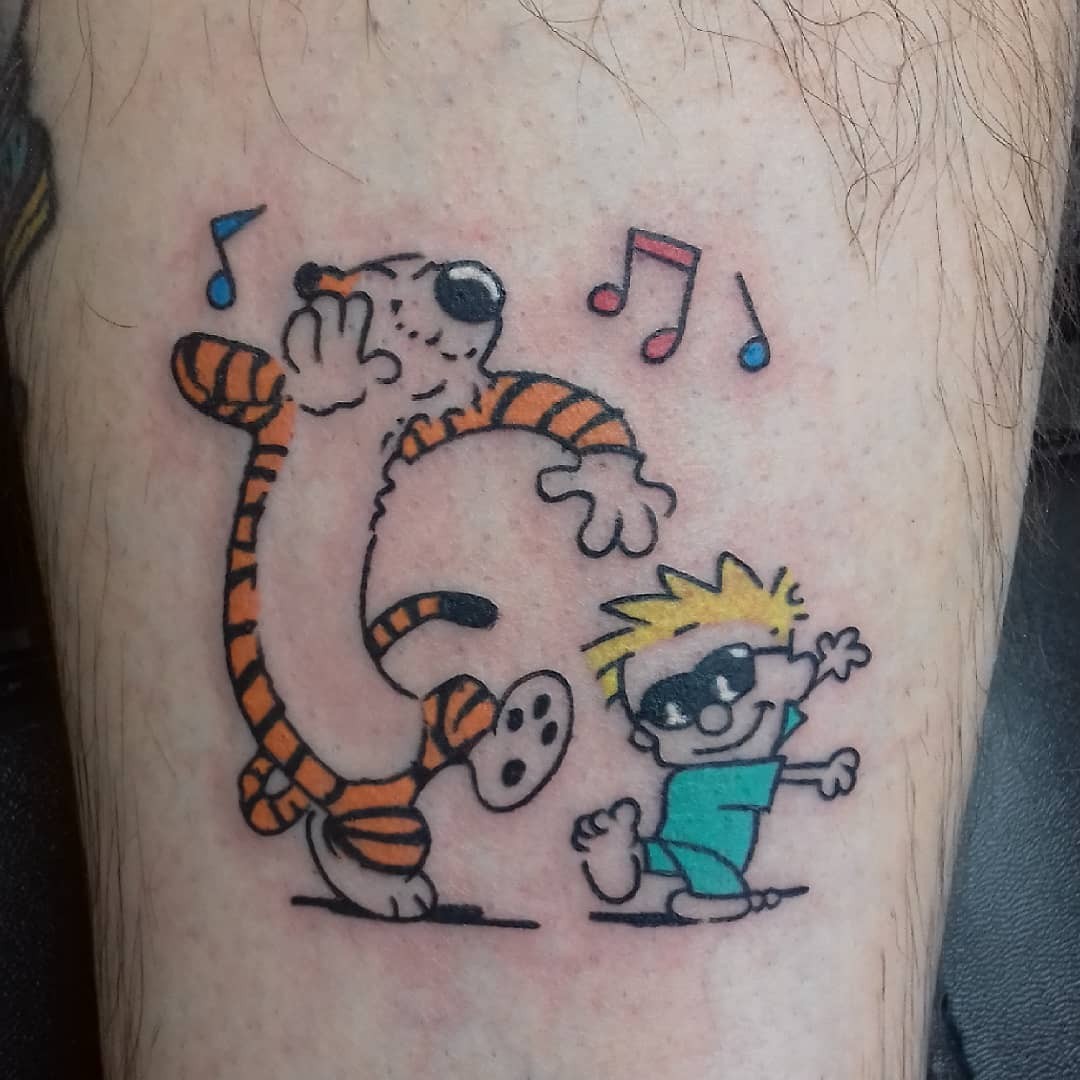 Colorful Calvin And Hobbes Tattoos Calvin Hobbes Having Fun Tattoo Piece On Leg