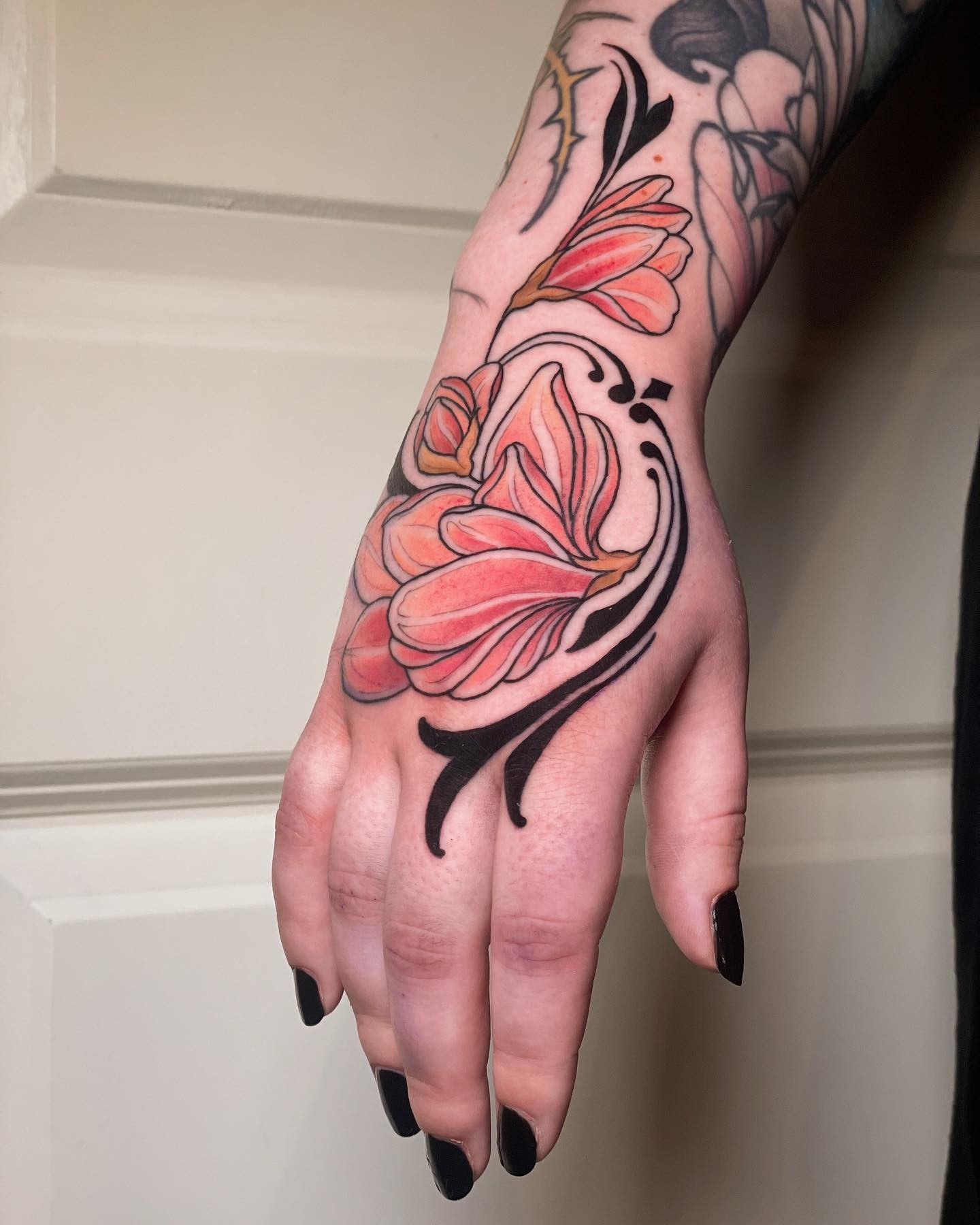 Magnolia Hand Tattoo