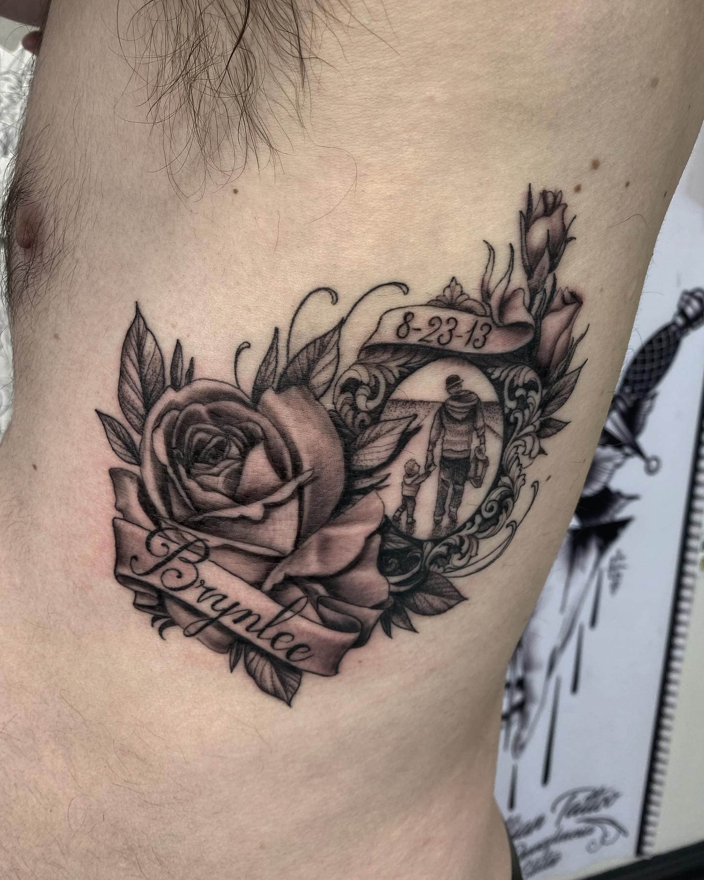 Child’s Name Tattoo With Flowers