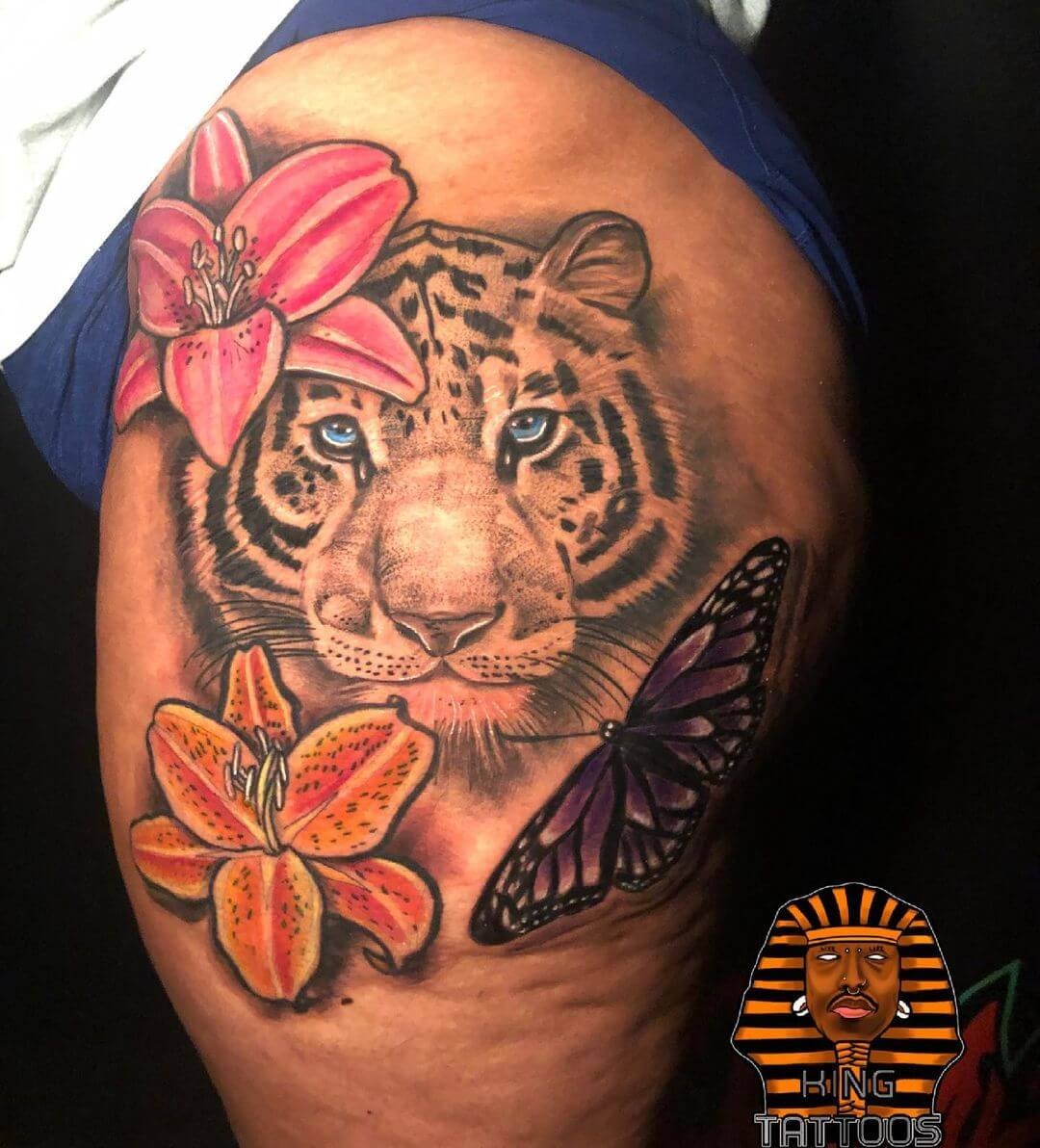 Tiger Lily Tattoo With A Tiger’s Face and Butterflies Tattoo Design