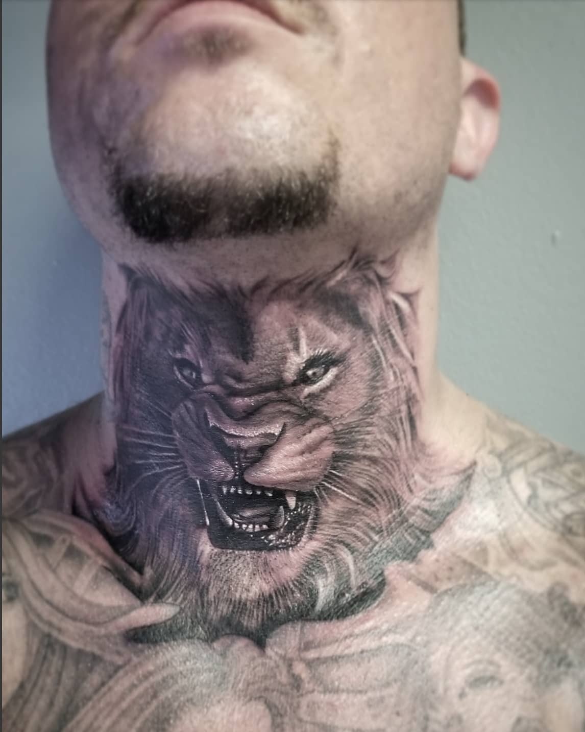 Lion Neck Tattoo