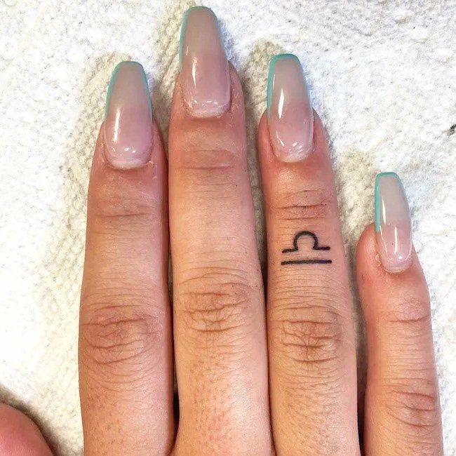 Finger Dot Tattoo