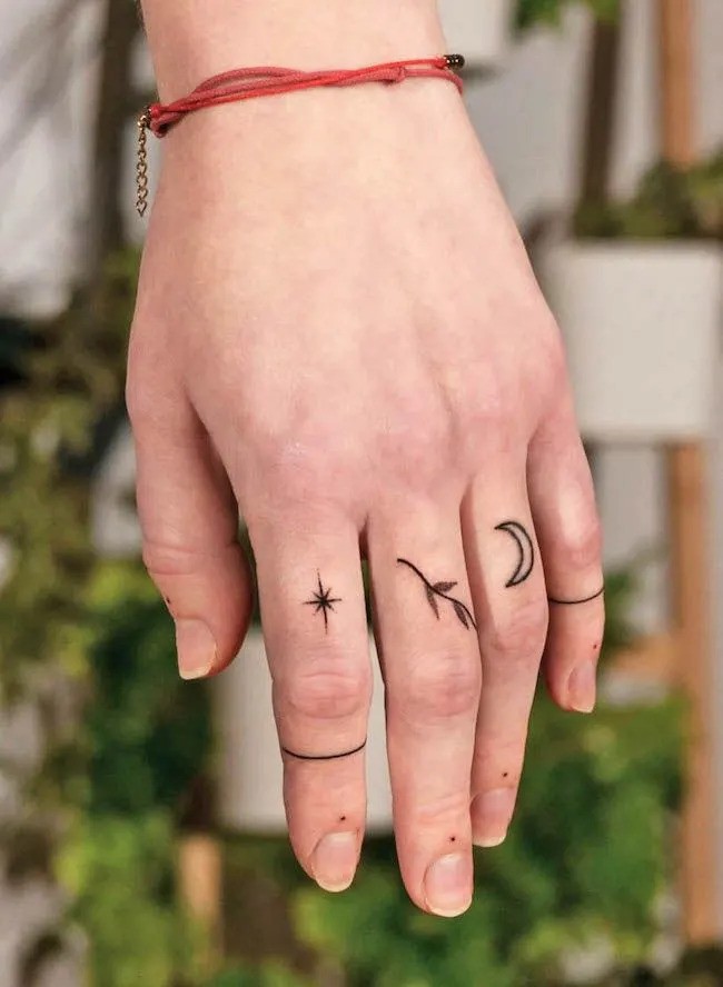 Finger Dot Tattoo