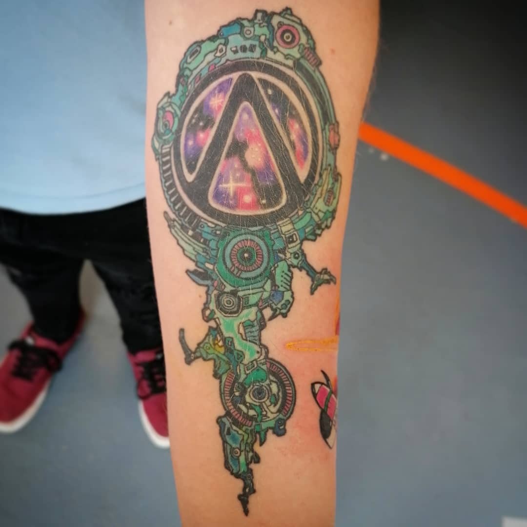 Cool Borderlands Vault Symbol Tattoo Experience Log Post-Apocalyptic Alien Vibes Tattoo