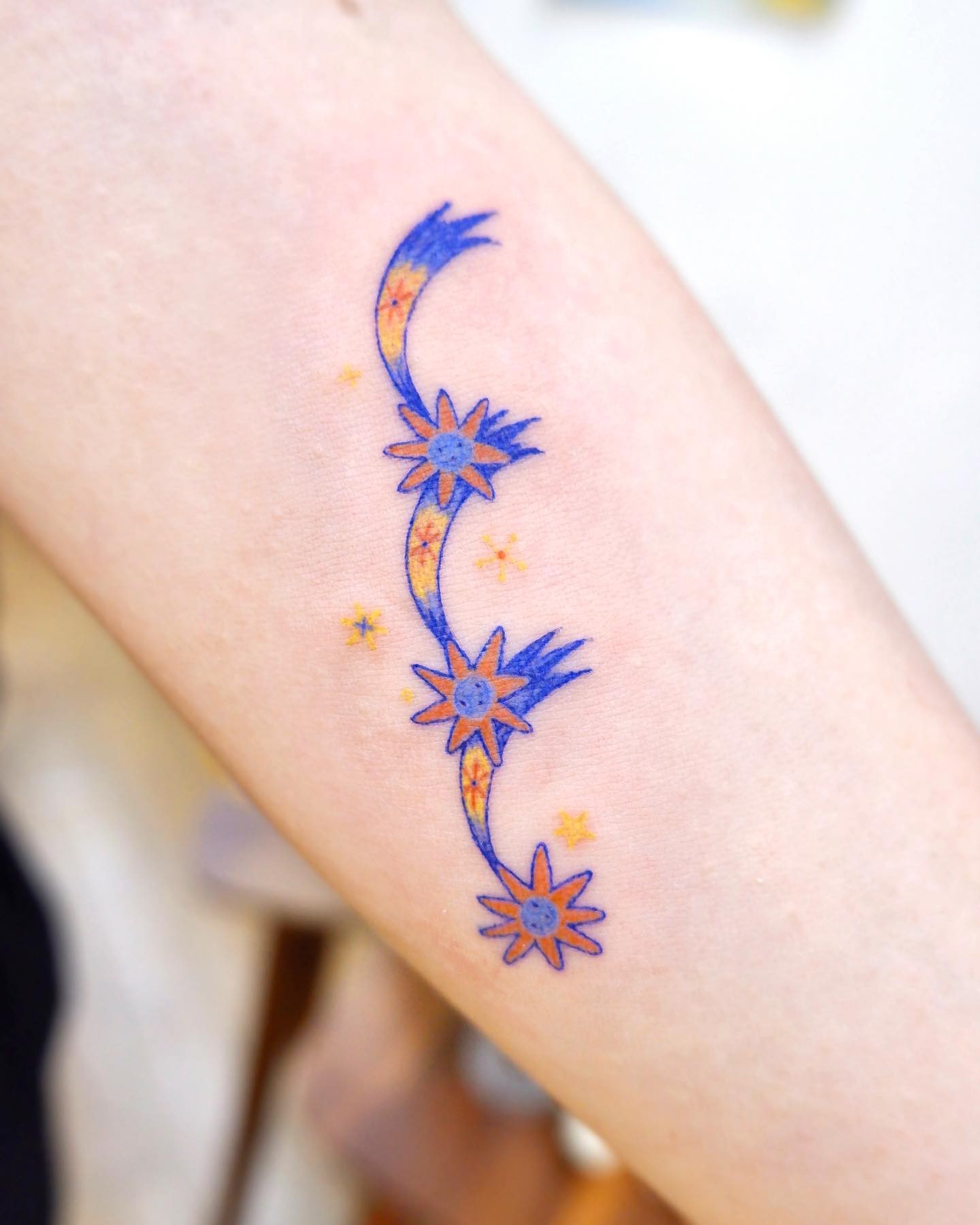 The Colourful Three Shooting Stars Tattoo