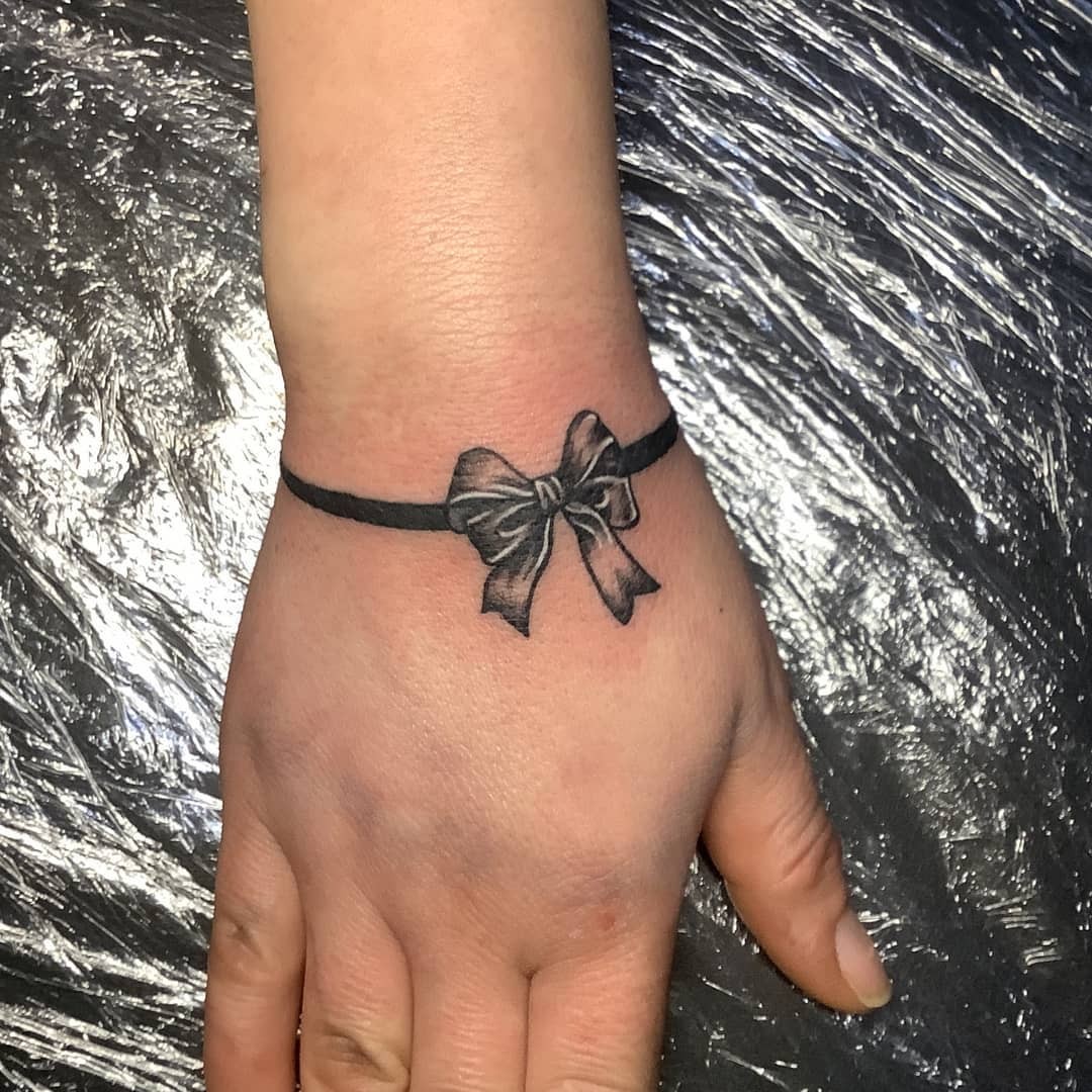 Feminine Bow Tattoo