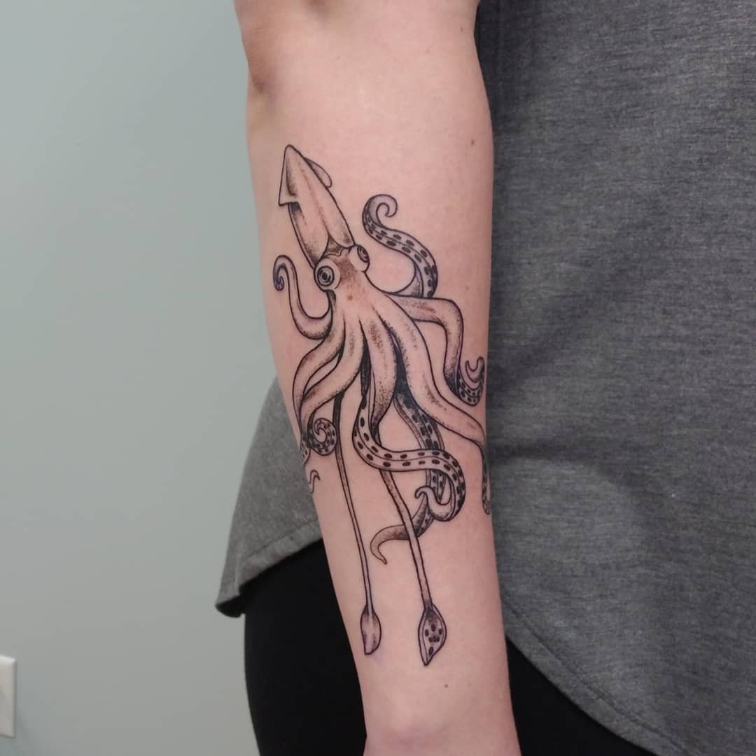 Simplistic Black Ink Squid Drawing Over Arm Tattoo Designs For Marine Life Lovers