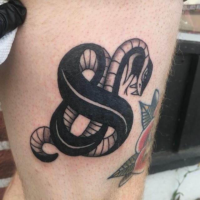 Bold Ampersand Tattoo With Snake Design