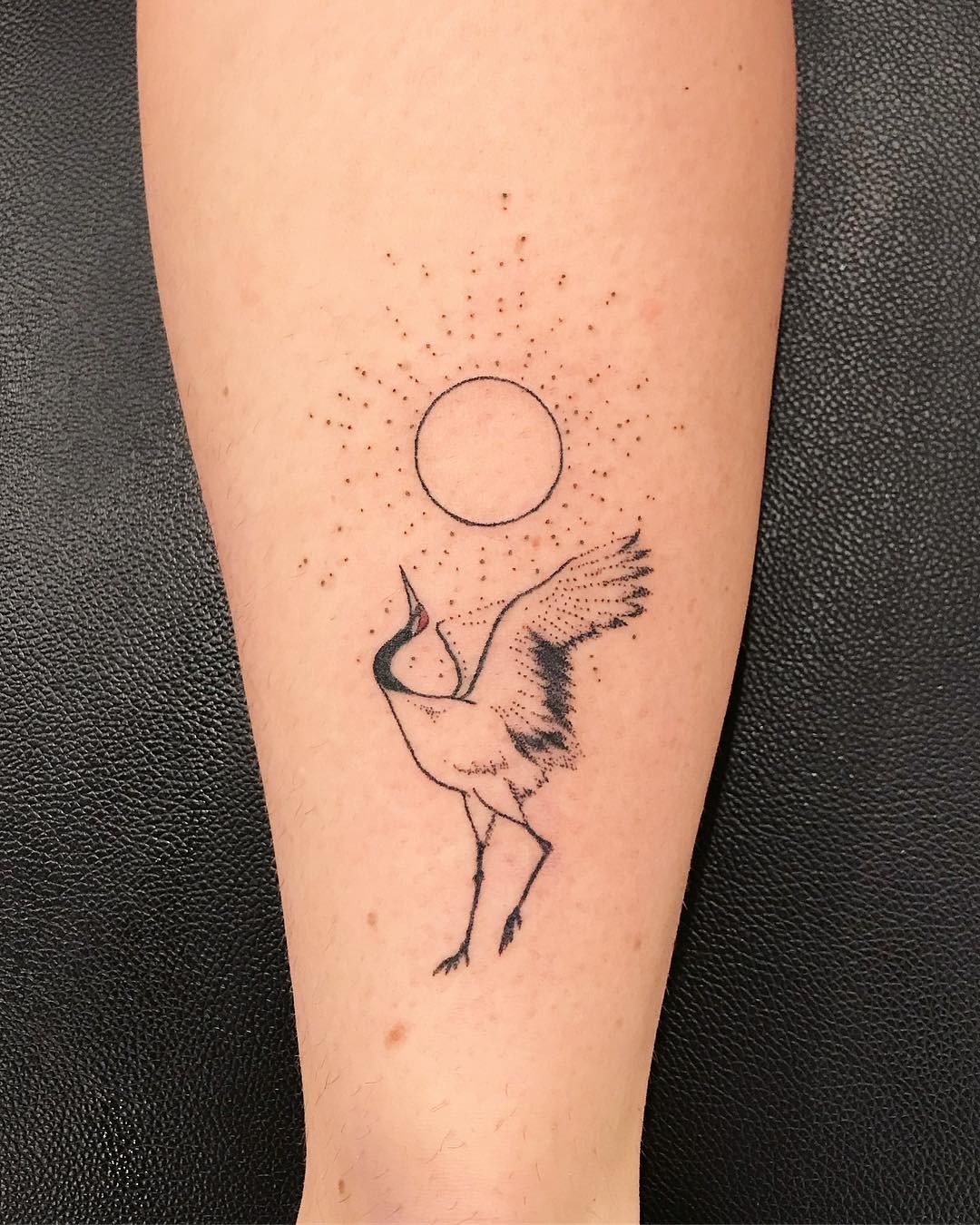 Minimalistic Japanese Crane Tattoo Design