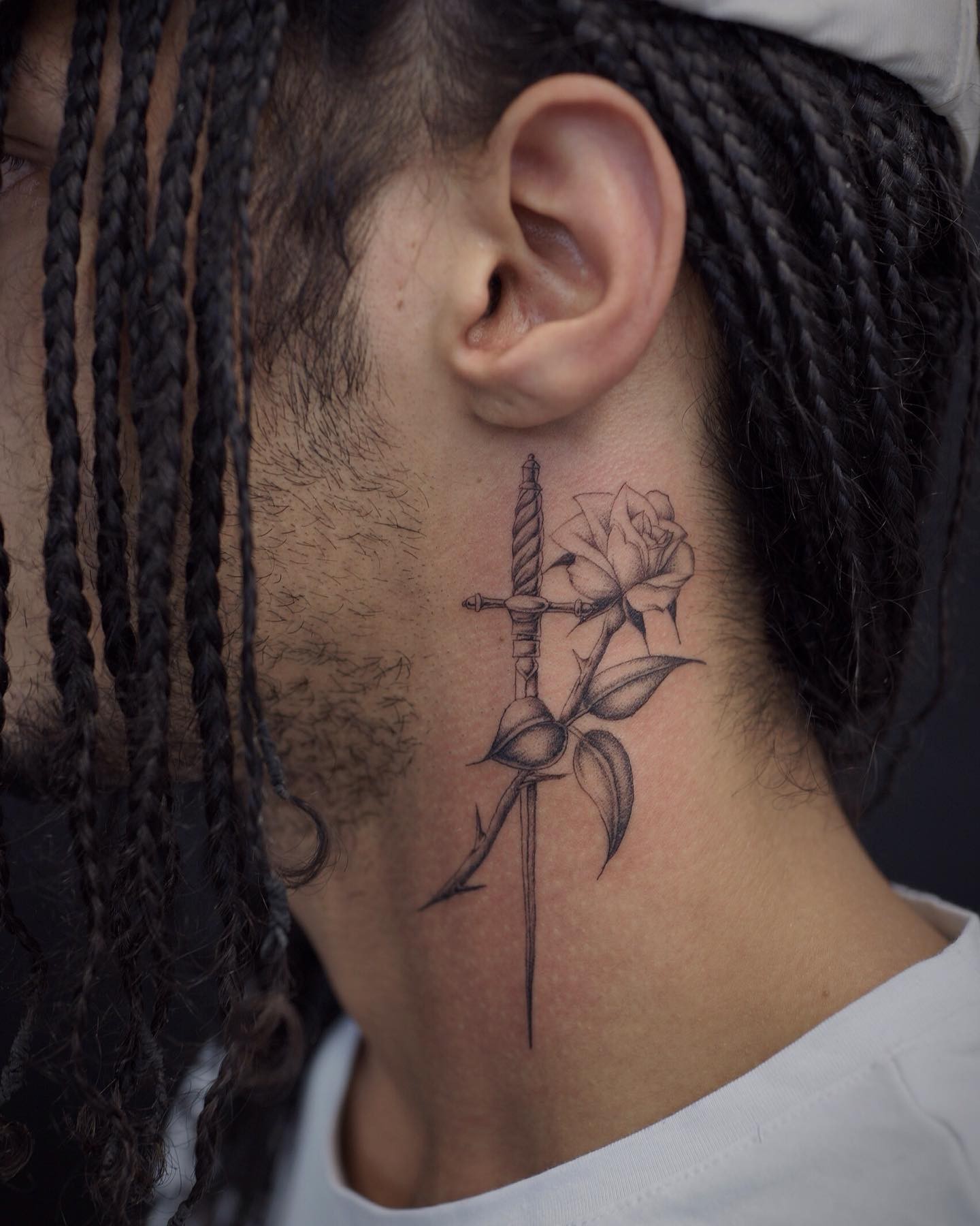 Rose And Sword Tattoo On The Neck