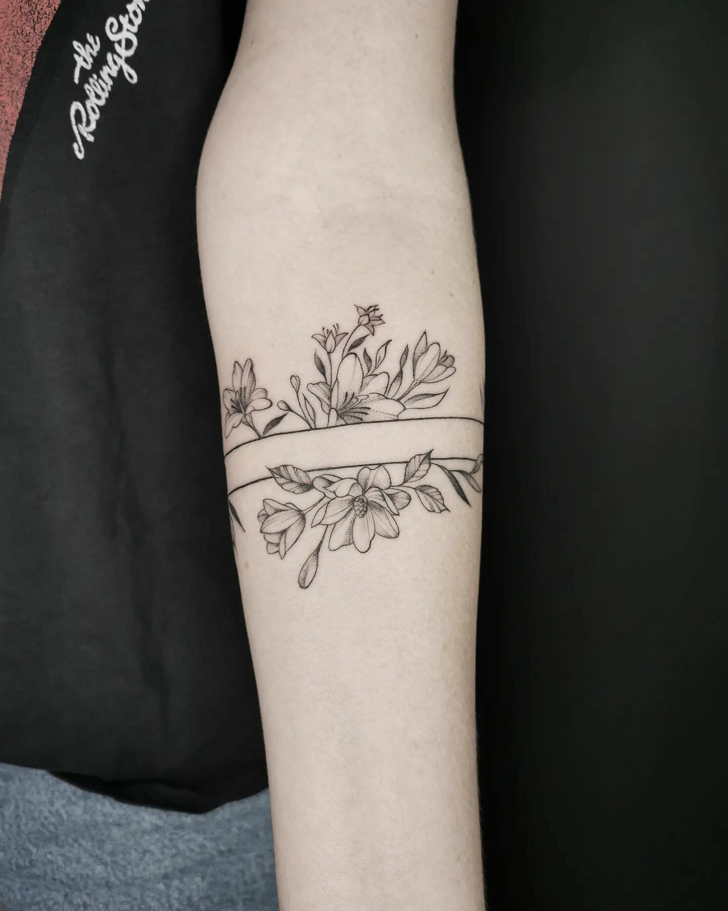 Unconventional Magnolia Flower Tattoo Design In The Style Of An Armband