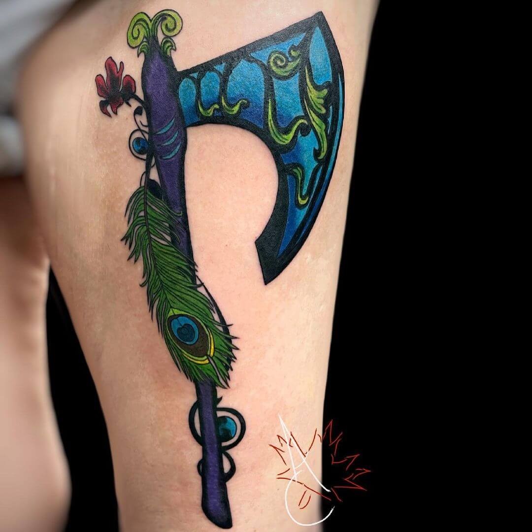 Eye-Catching Blue Axe Tattoo