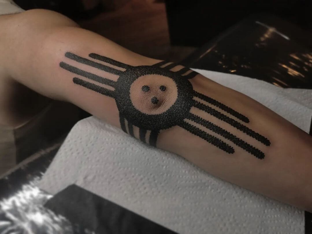 Geometric Circular Face Nazca Line Tattoo