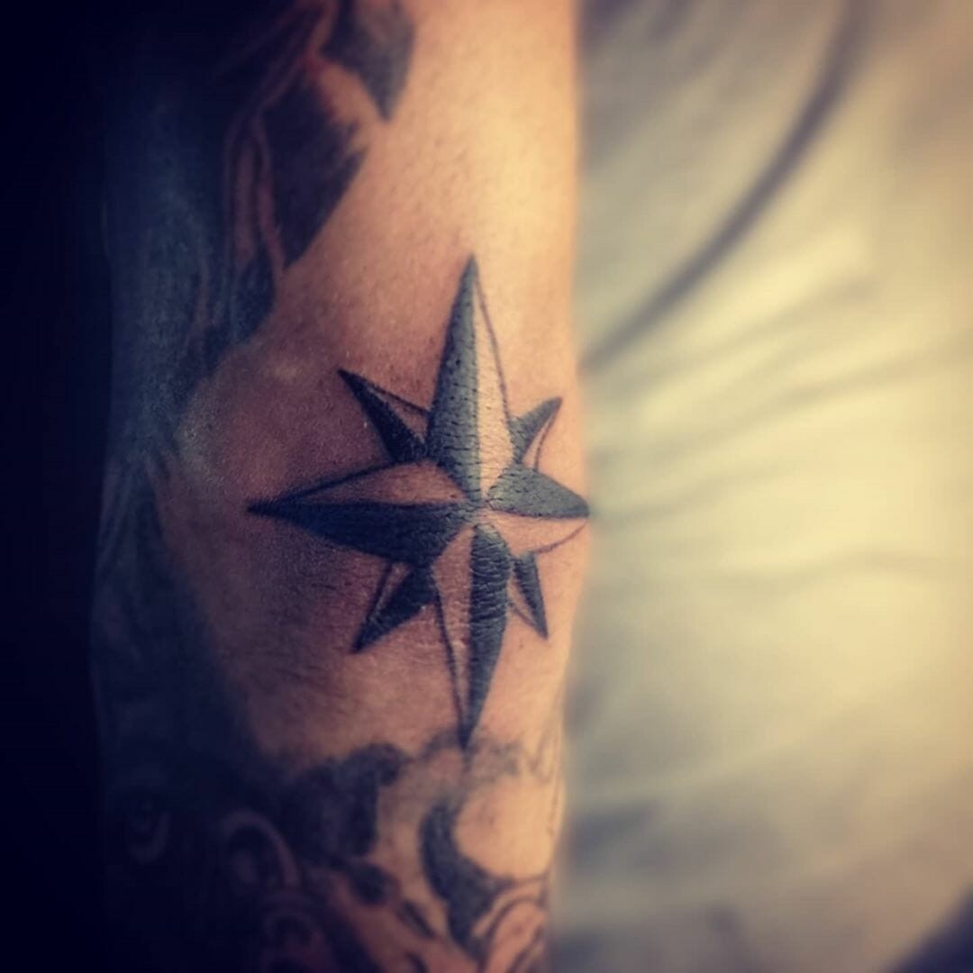 Stylized Stars Tattoo For Men Nautics North Star Tattoo Idea Black and Gray Ink