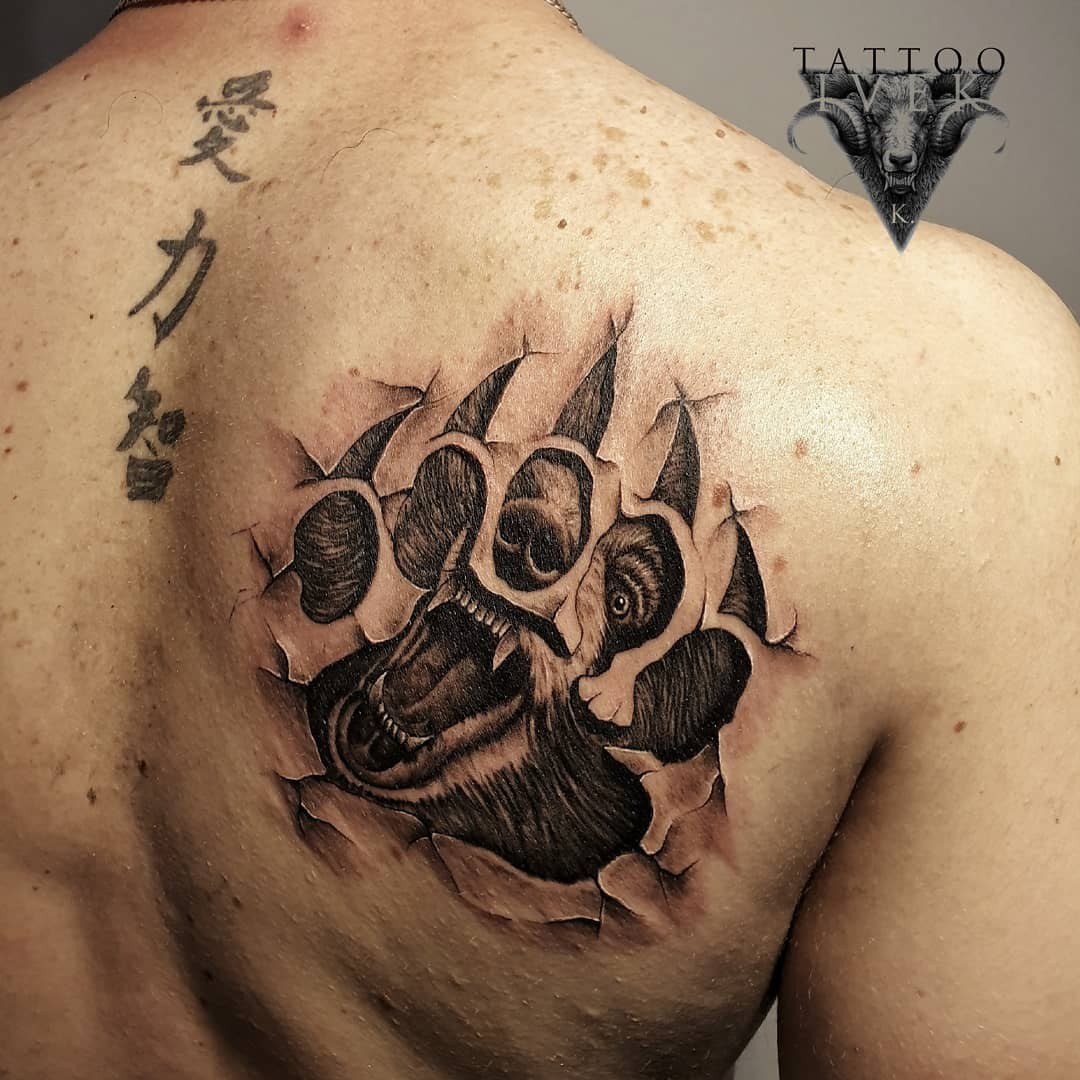 Ripped Skin Tattoo Design Bear Paw