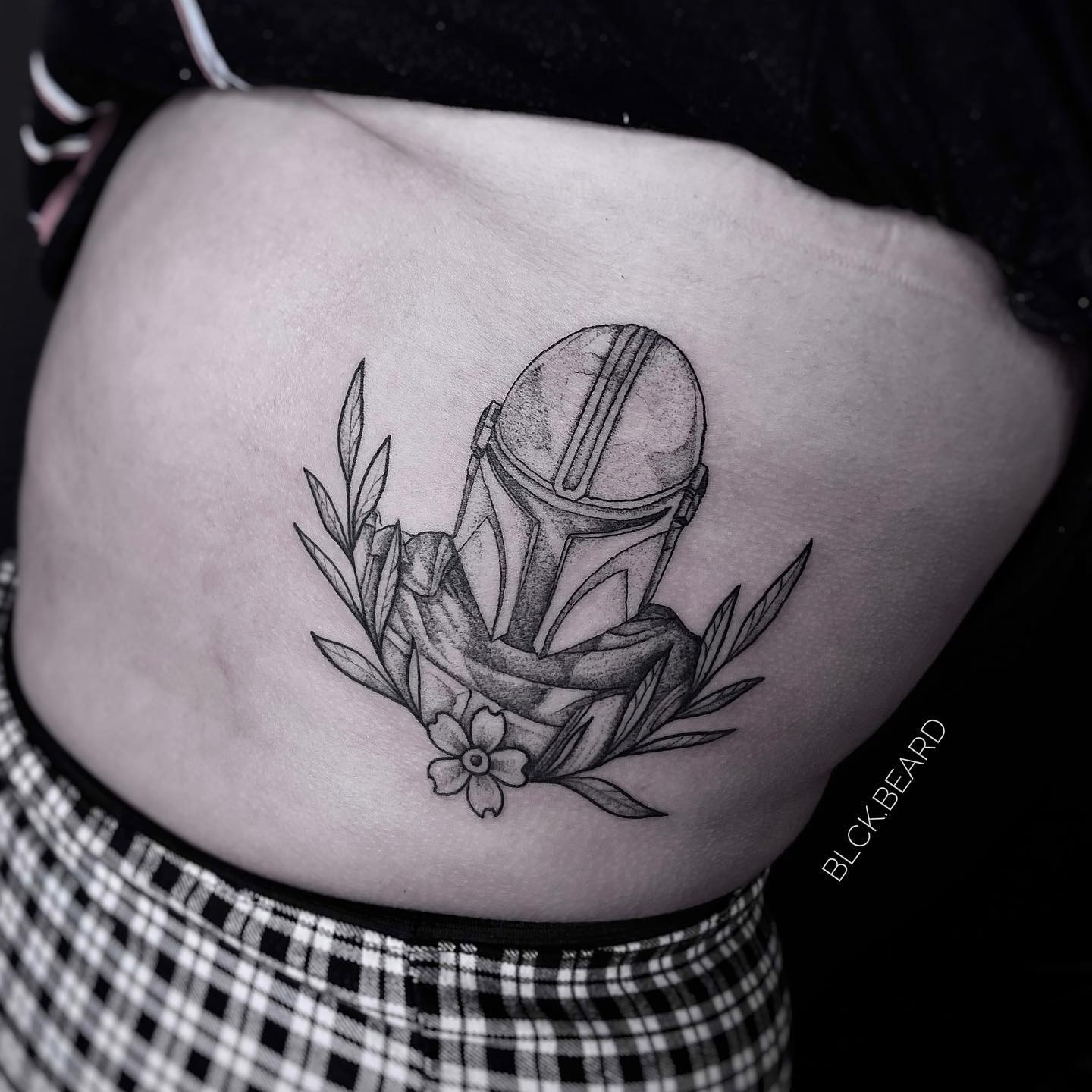 Mandalorian Helmet With Floral Designs Tattoo