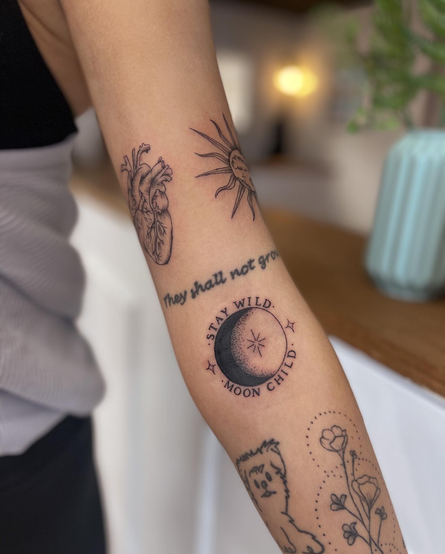 Patchwork Clouds Inside Sun Tattoo On The Inner Bicep