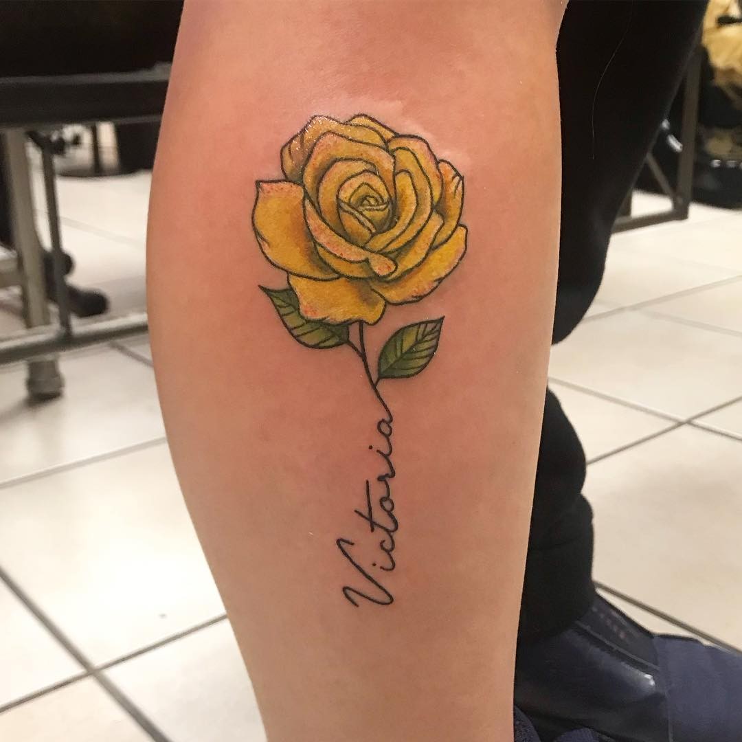 Yellow Rose Tattoo With A Meaningful Text